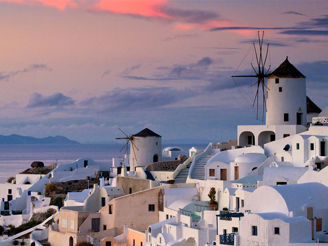 oia_greece_city_houses_sunset_ocean_water_sky_clouds_16557_1920x1080.jpg