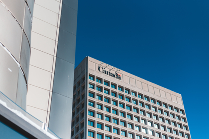 white-concrete-building-under-blue-sky-4062527.jpg