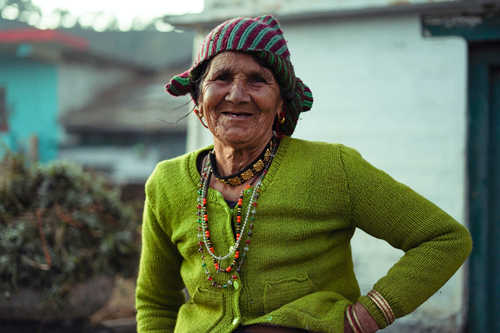 woman-in-green-sweater-smiling-4511649.jpg